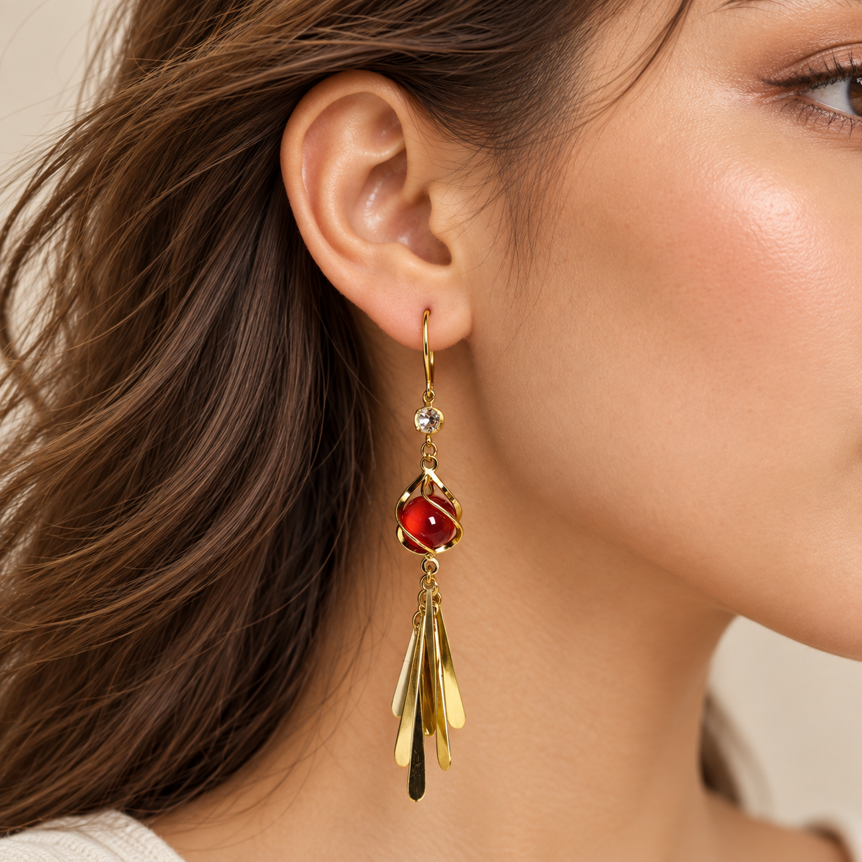 Ruby Glow Gold Tassel Drop Earrings