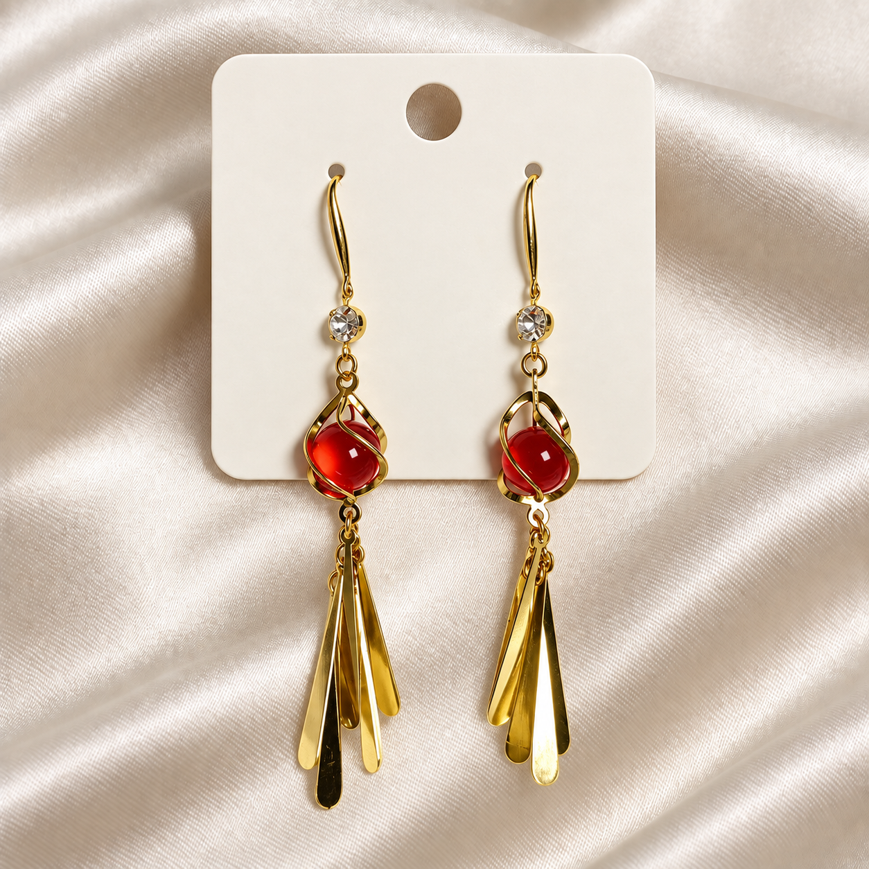 Ruby Glow Gold Tassel Drop Earrings